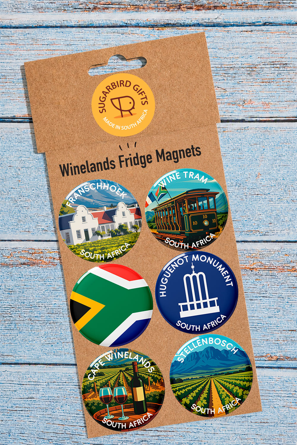 Cape Winelands Fridge Magnet Pack — set of 6 round magnets featuring Franschhoek, Wine Tram, SA Flag, Huguenot Monument, Cape Winelands, and Stellenbosch