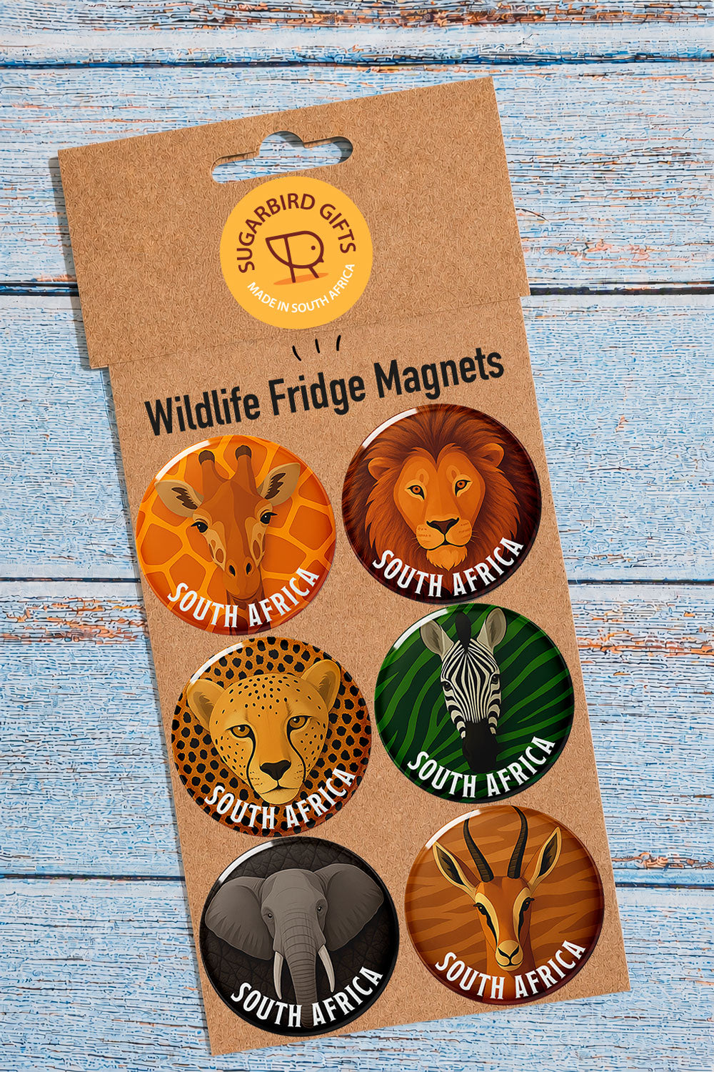 Wildlife Fridge Magnet Pack — set of 6 round magnets featuring Giraffe, Lion, Cheetah, Zebra, Elephant, and Springbok